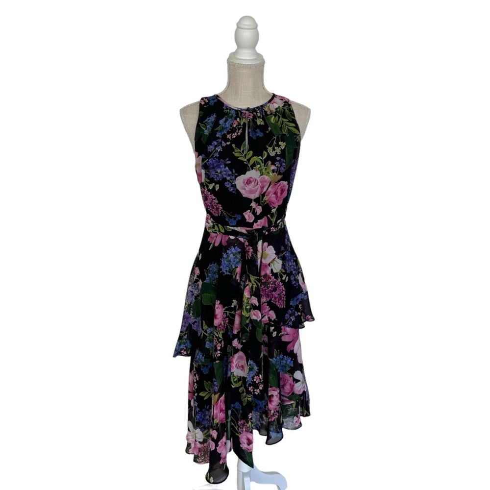 Size two Tahari asymmetrical black dress with large flowers and waist band